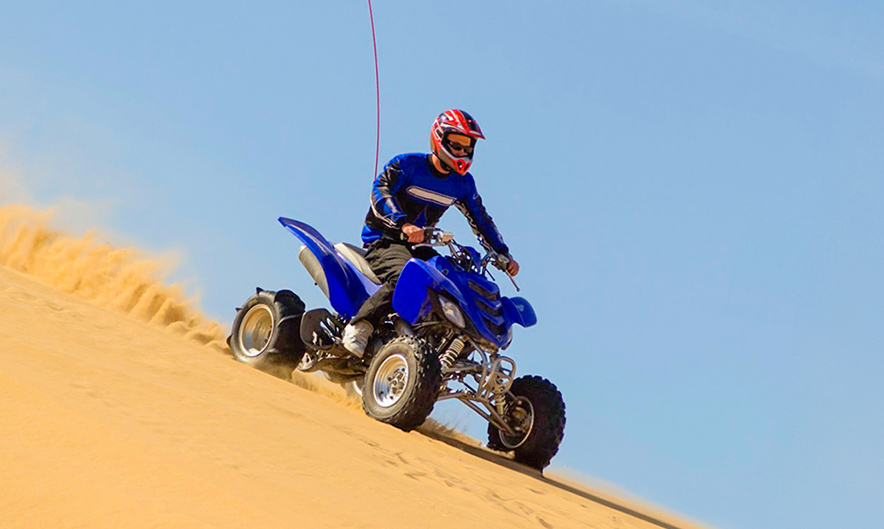 Yamaha Raptor 700 CC quad bike in Dubai desert